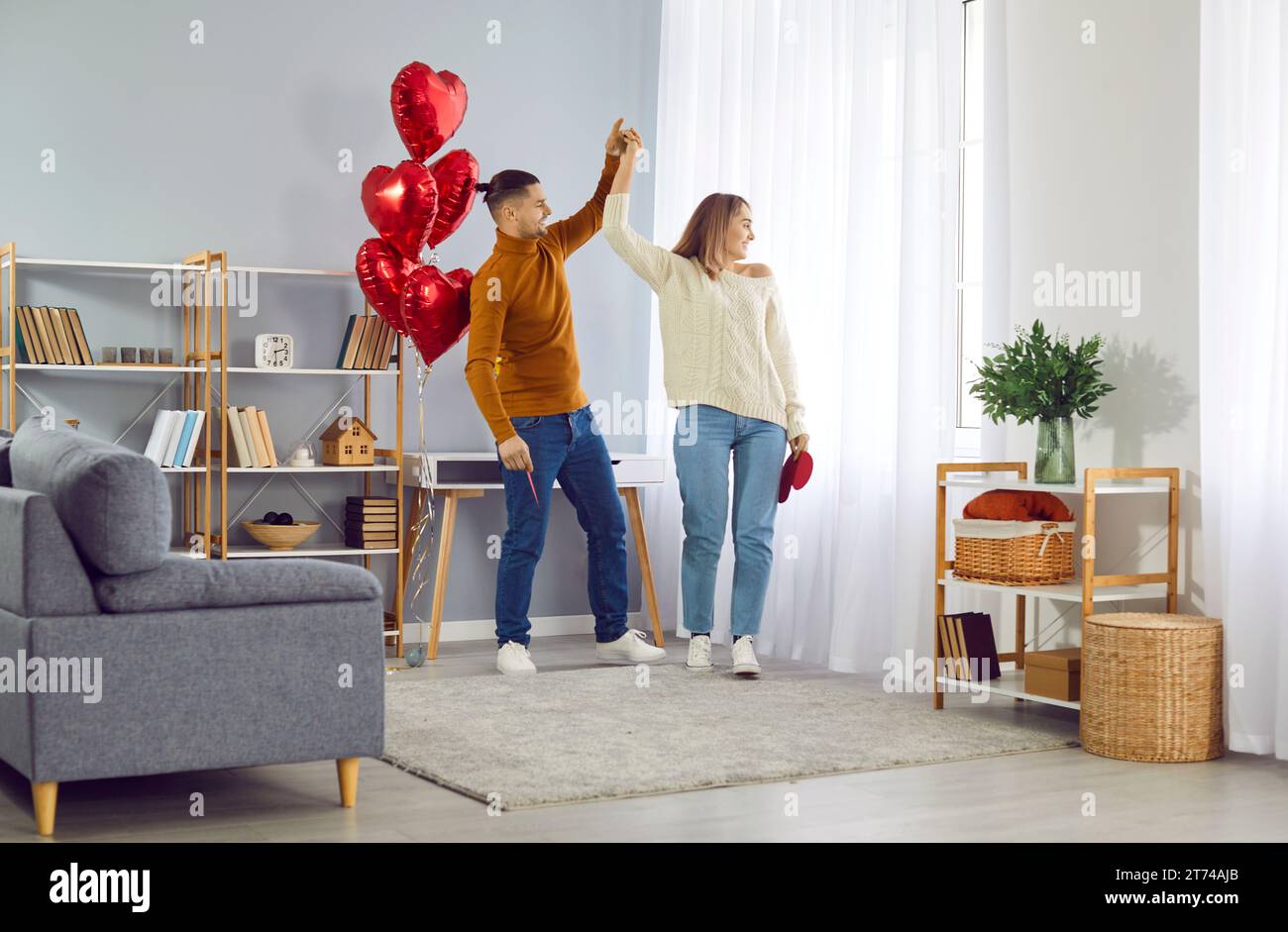 Happy young loving family couple having fun while celebrating Valentine ...