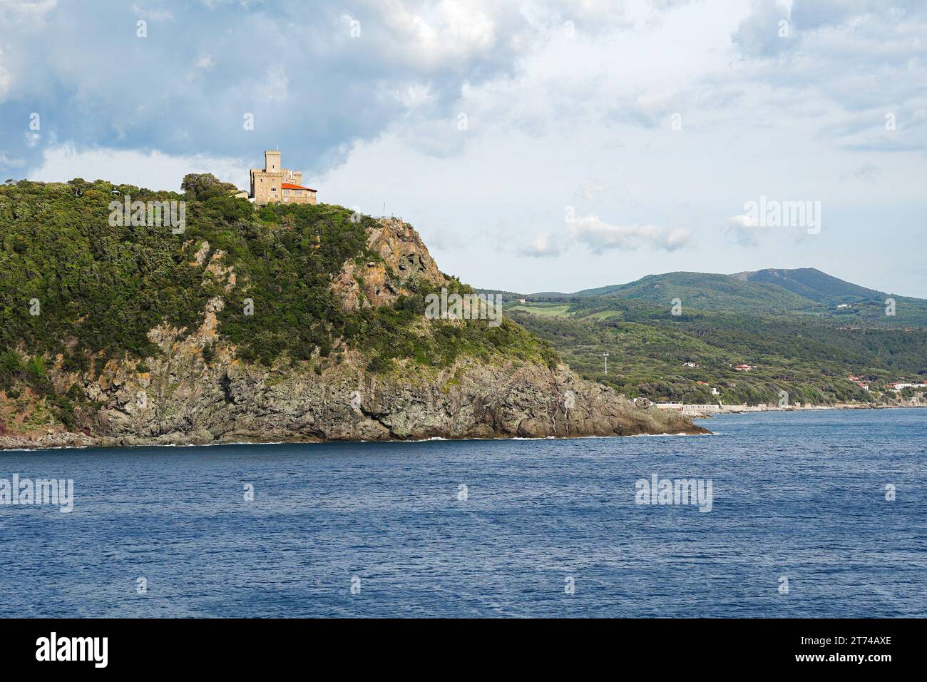 Castle on the cliff by The Ligurian Sea. Sonnino Castle in Quercianella, Tuscany, Italy Stock Photo