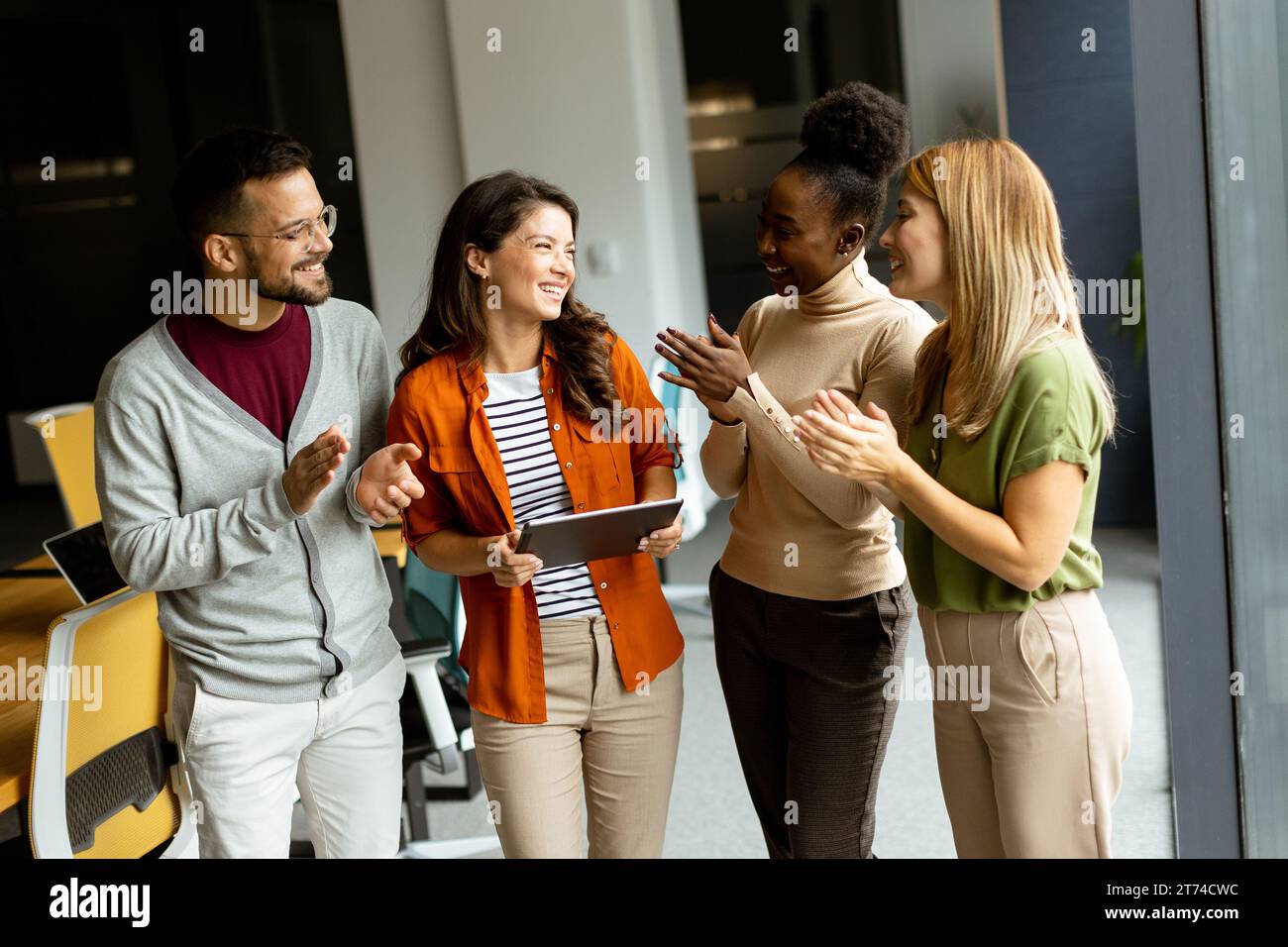 Young multiethnic startup team working at the modern office Stock Photo