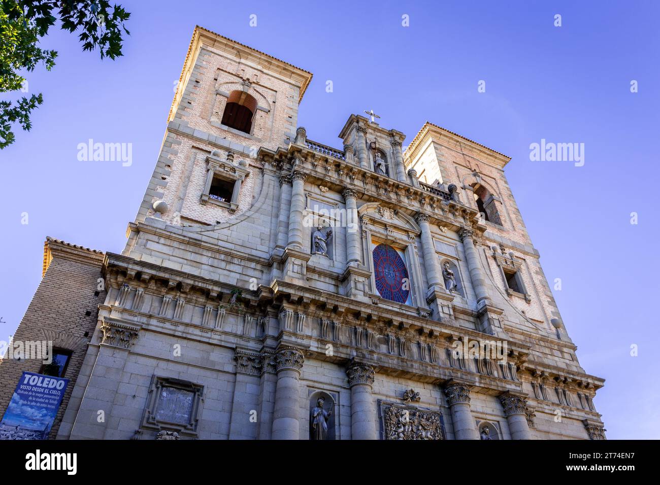 Toledo, Spain, 08.10.21. Church of San Ildefonso (Jesuit church), baroque style building with richly decorated facade with reliefs. Stock Photo