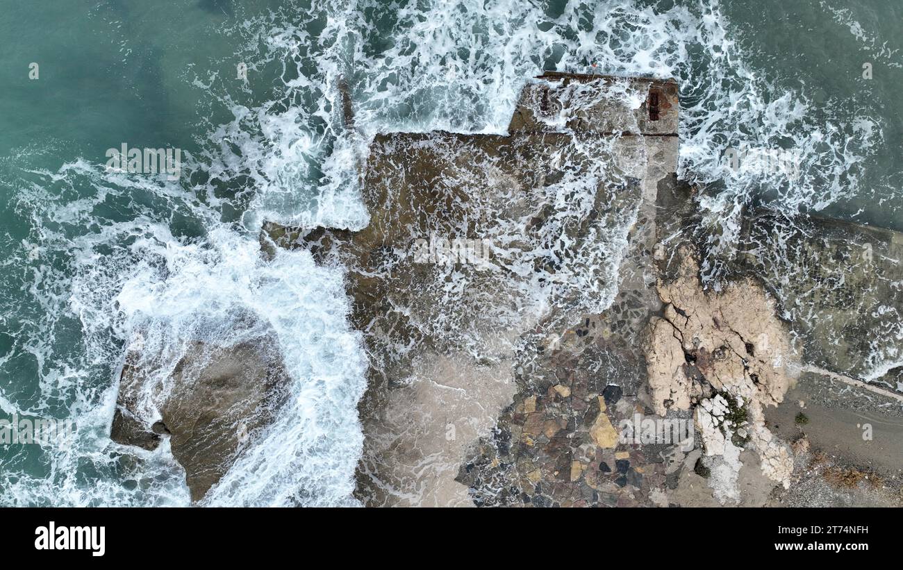 Aerial video beach rocks sea hi-res stock photography and images - Alamy