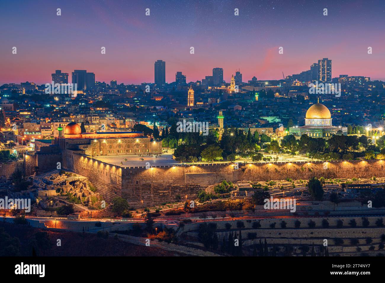 Dreamscape of Jerusalem's old city at twilight featuring the Dome of the Rock and Al-Aqsa mosque on the Temple Mount and a starry night Stock Photo