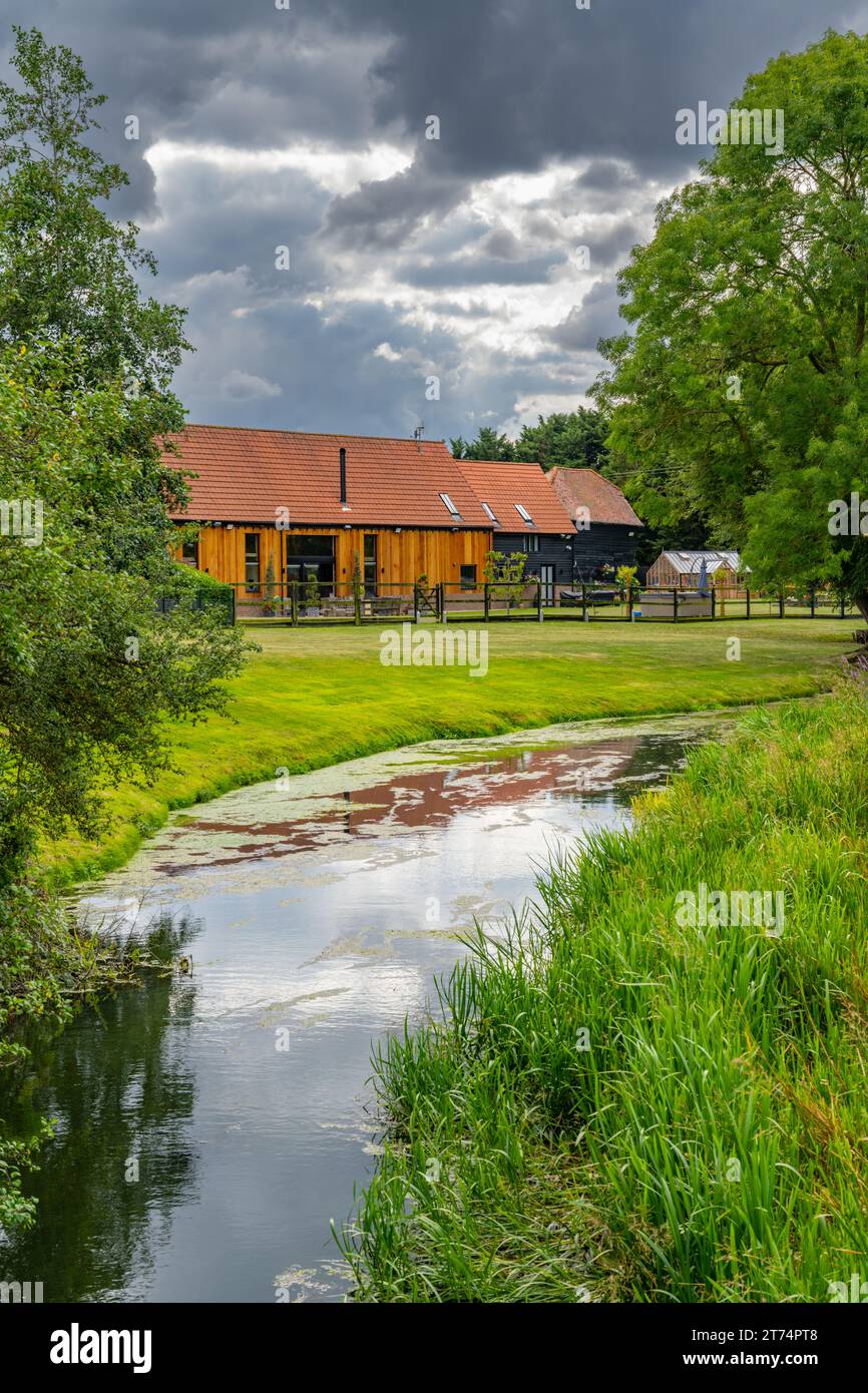 House by the river Roding at Fyfield, Ongar, Essex Stock Photo