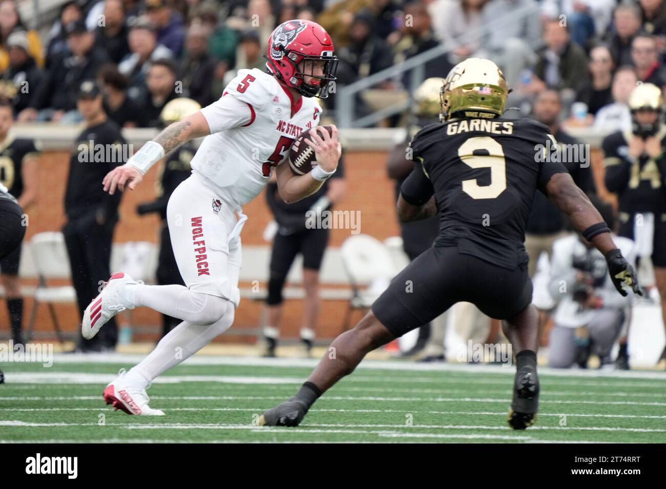 Salem Rrt North Carolina State quarterback Brennan Armstrong (5) runs against ...