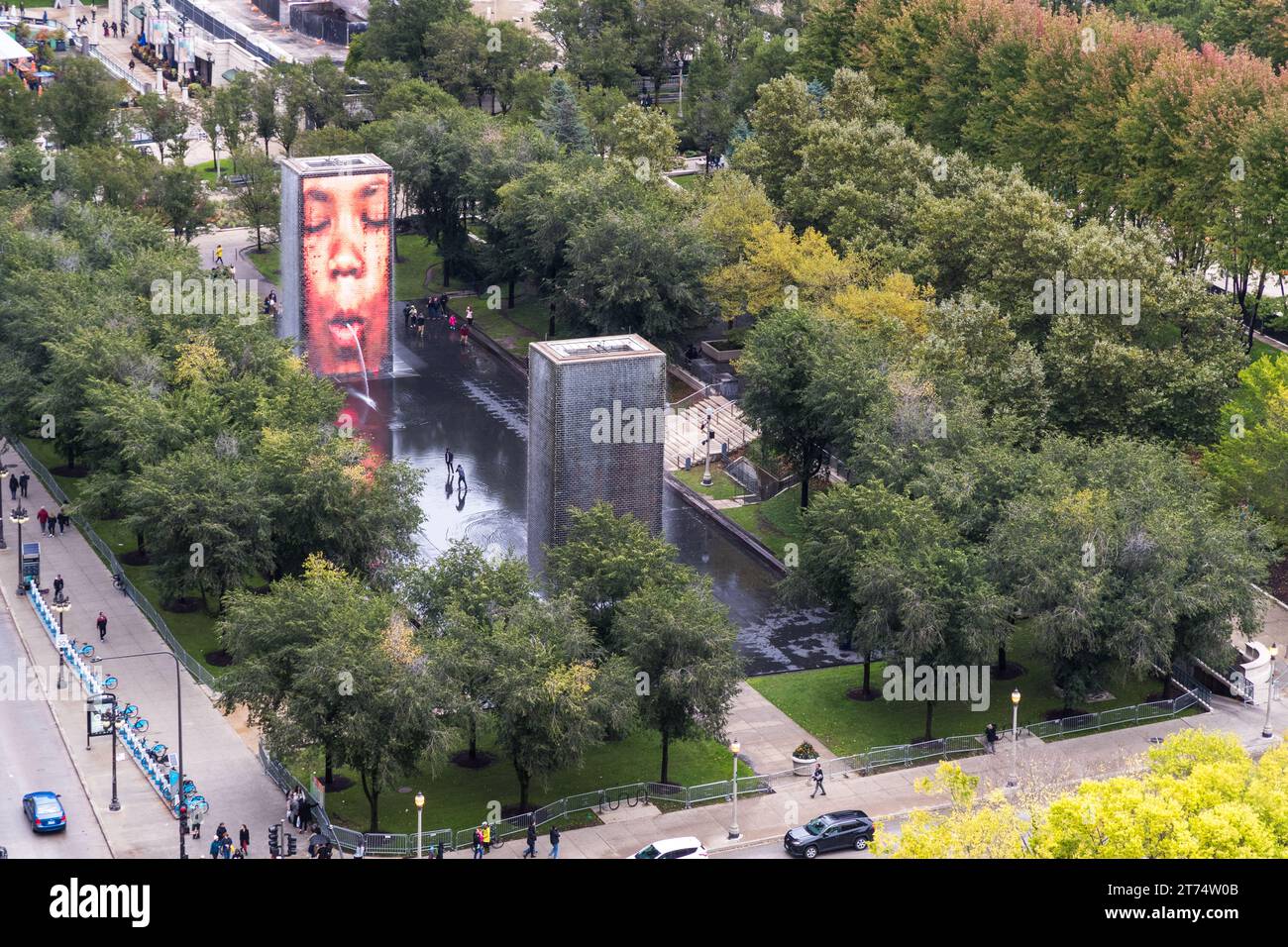 The Crown Fountain is a public sculpture with 2 50-ft. LED towers & a reflecting pool, by Catalan artist Jaume Plensa in Chicago, United States Stock Photo