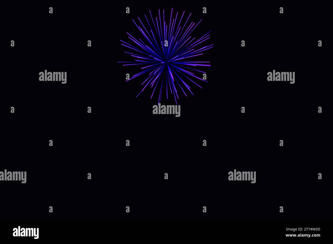 New Year's Night, Diwali, bonfire night Starbursts and Rocket Explosions on Black Background Sky with Red, Green, Blue, Purple, Gold Colour fireworks Stock Photo
