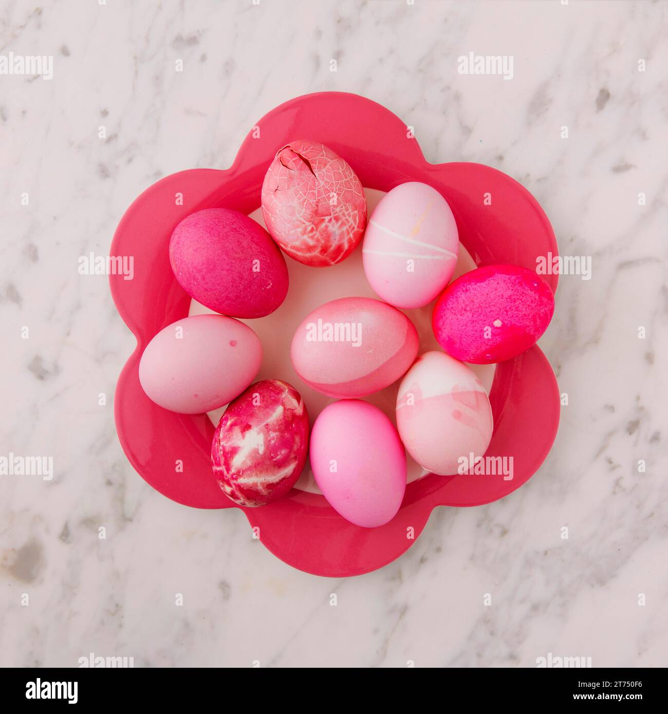 Set pink easter eggs plate Stock Photo