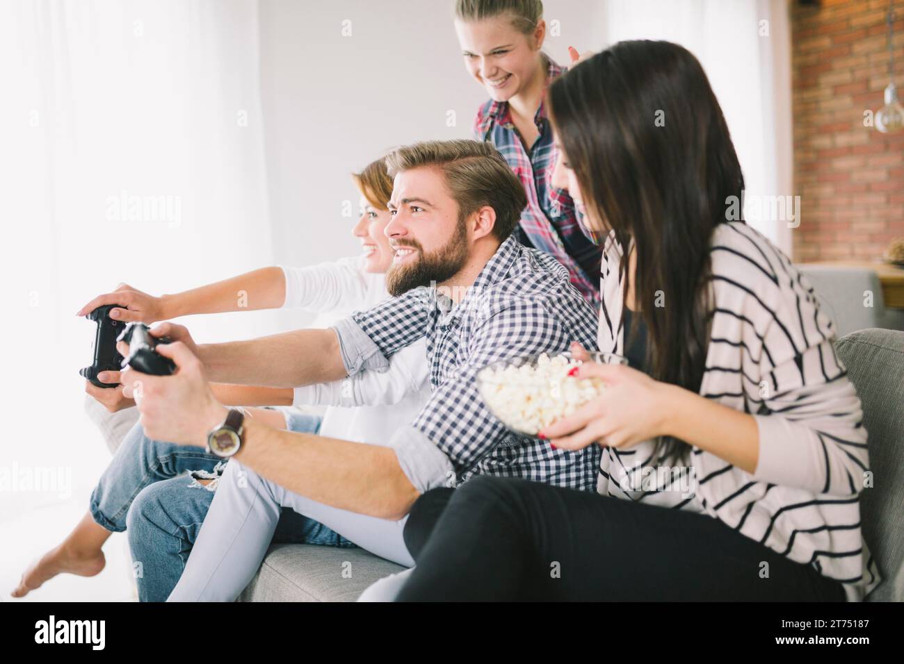 Cheerful people playing game party Stock Photo