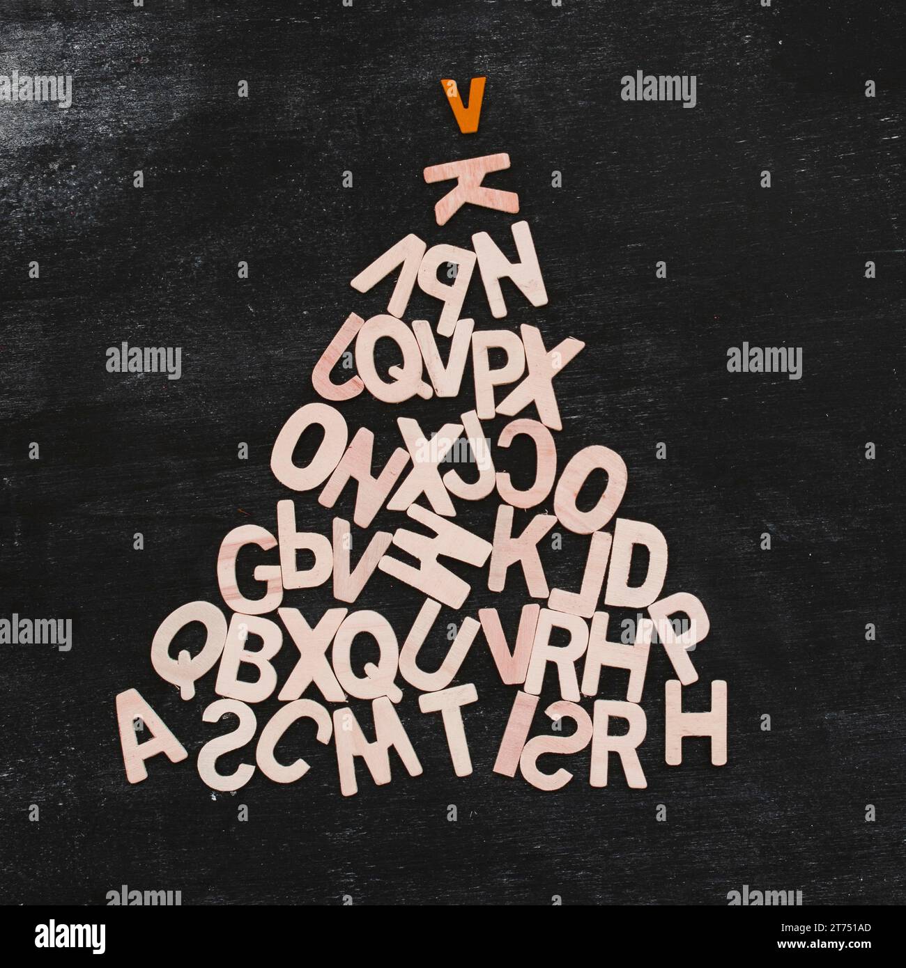 Christmas tree made from wooden letters Stock Photo - Alamy