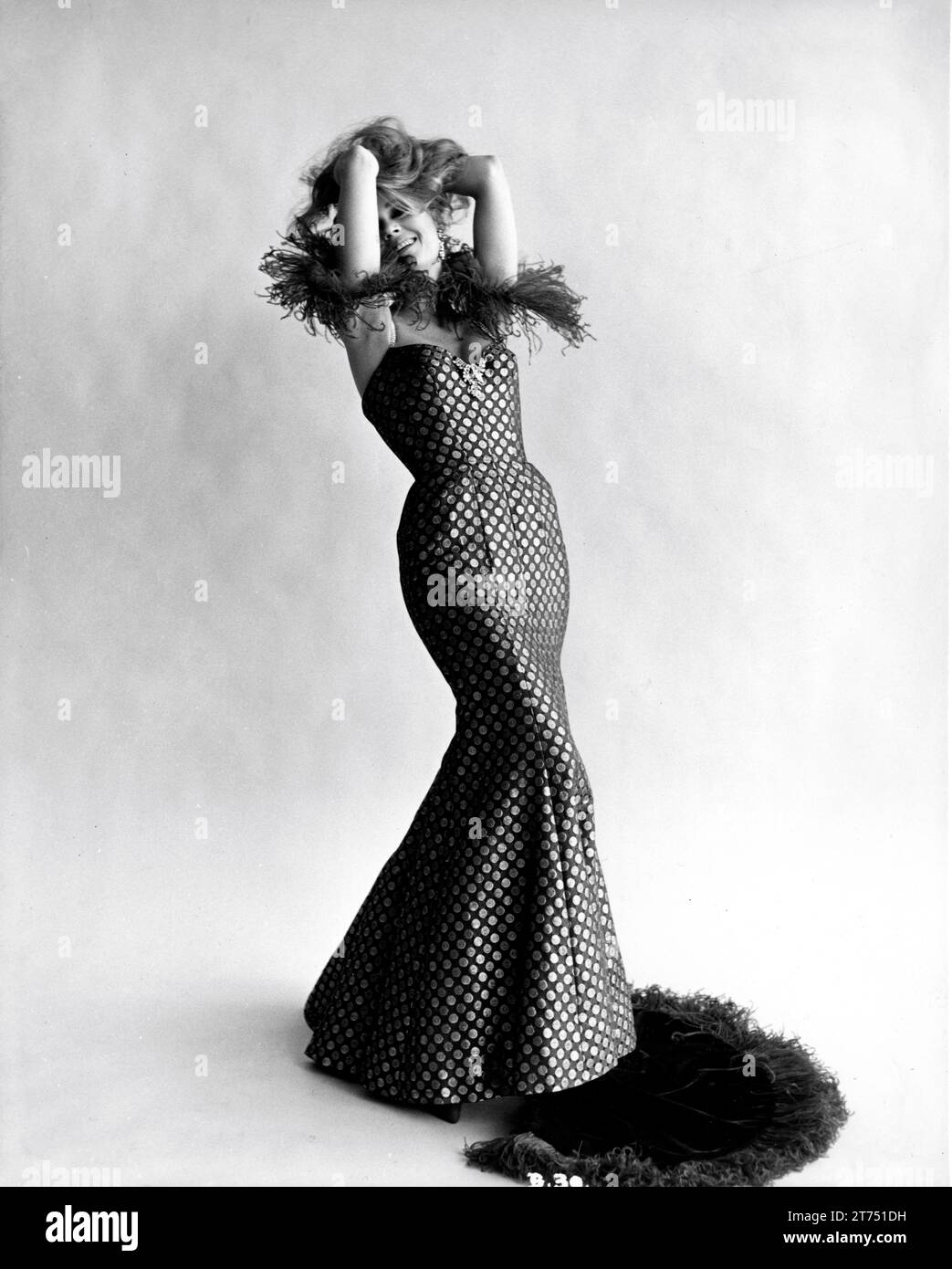 JANE FONDA full length portrait in CAT BALLOU 1965 director ELLIOT SILVERSTEIN gowns for Miss Fonda by Bill Thomas Harold Hecht Corporation / Columbia Pictures Stock Photo