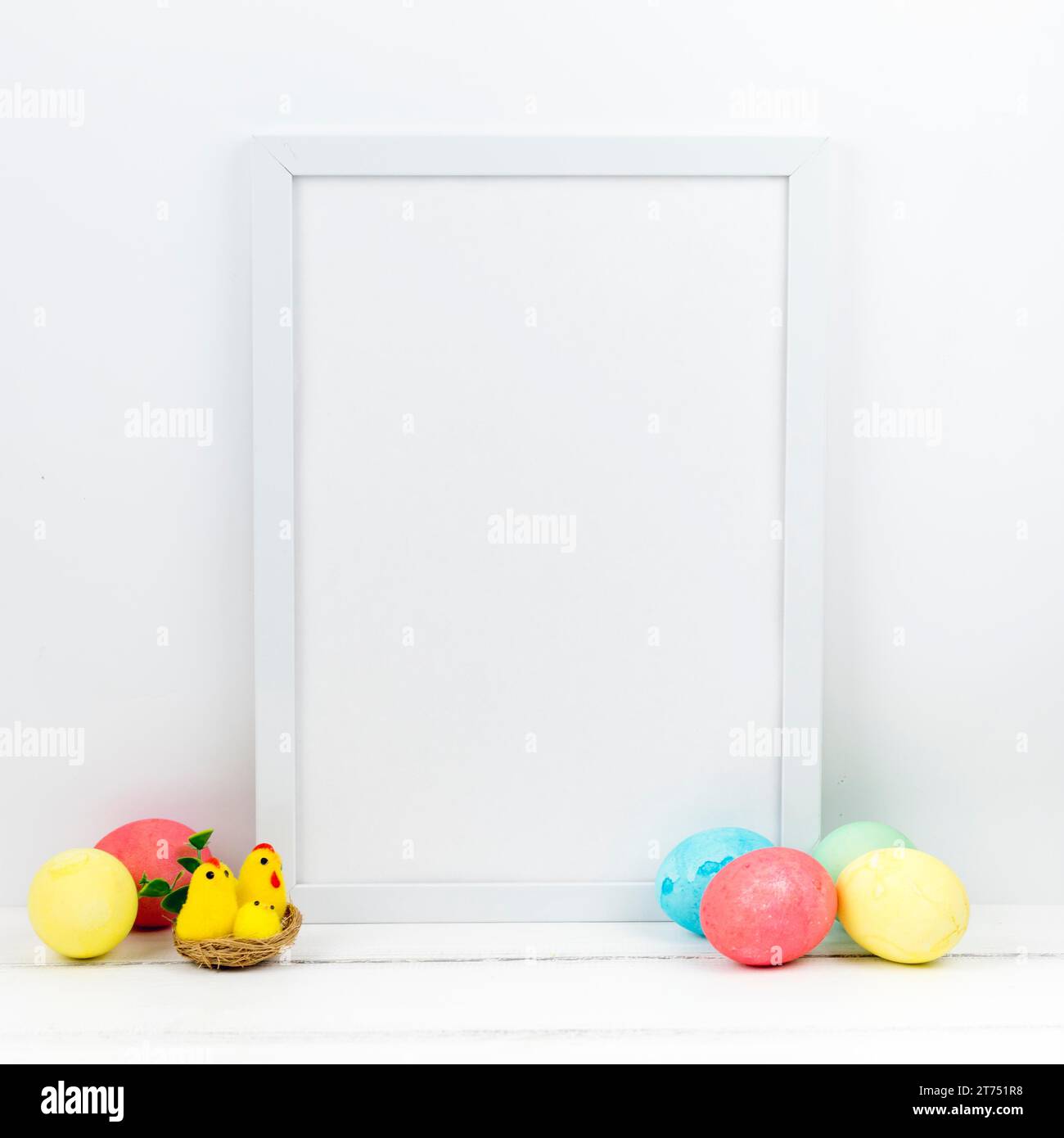 Colourful easter eggs with blank frame table Stock Photo
