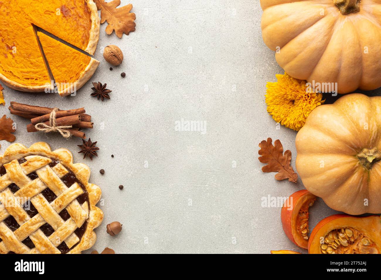 Flat lay decoration with pumpkins stucco background Stock Photo