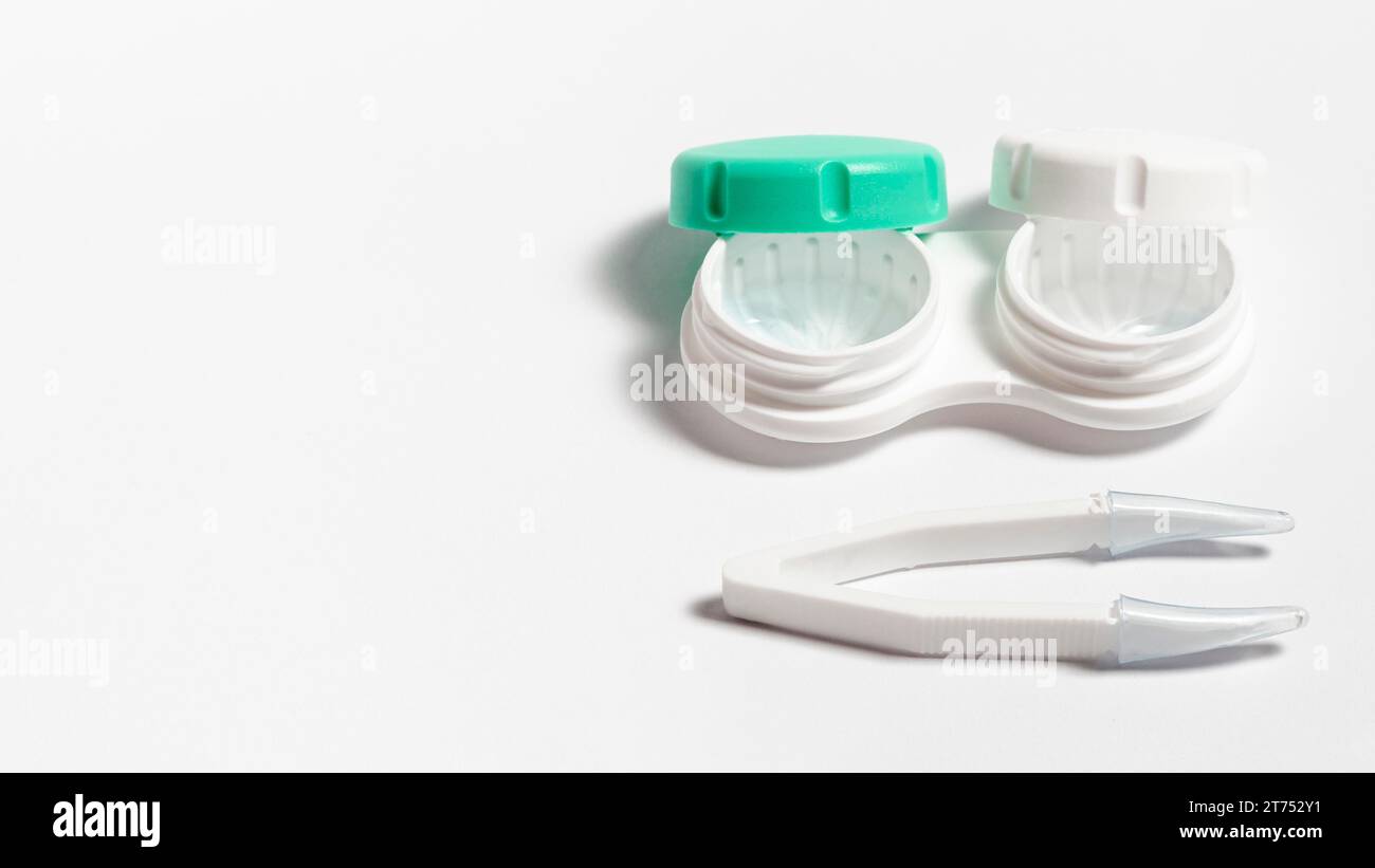 High angle contact lenses case with copy space tweezers Stock Photo