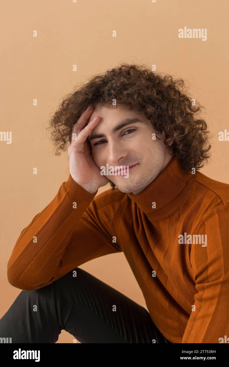 Portrait curly haired young man 13 Stock Photo