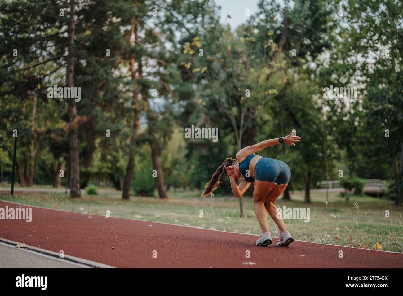 Fit and flexible female athlete inspire with 360 degree cartwheels and ...