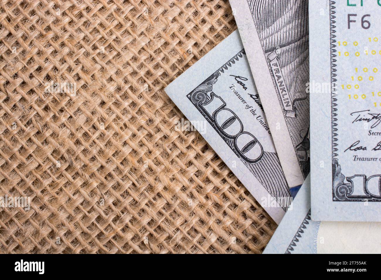 Banknote of US dollar placed on a linen canvas Stock Photo - Alamy