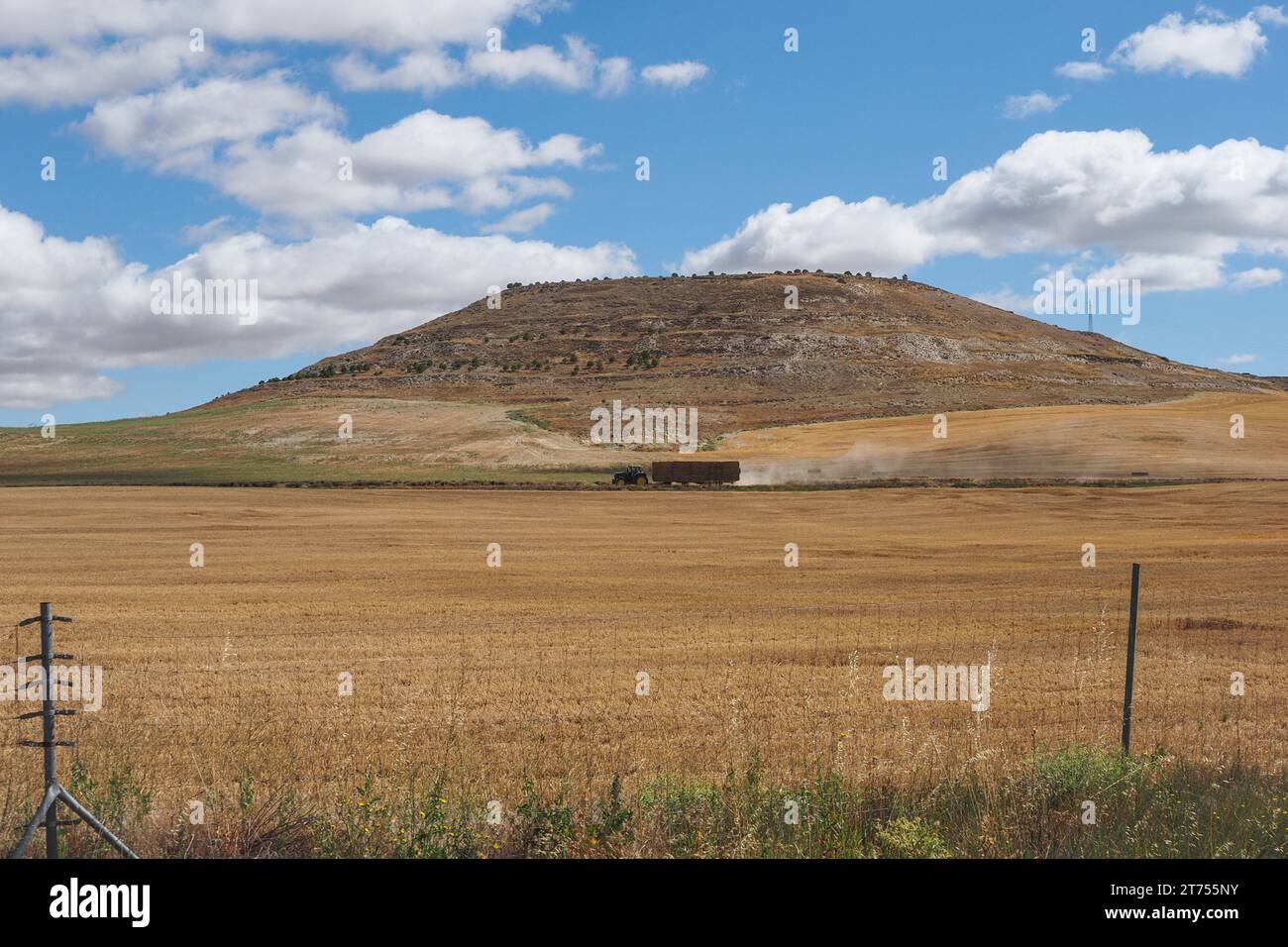 Beautiful Spanish countryside. Panoramic view to stubble field near the Fuentes de Valdepero, Palencia, Spain. Agricultural landscape. Stock Photo