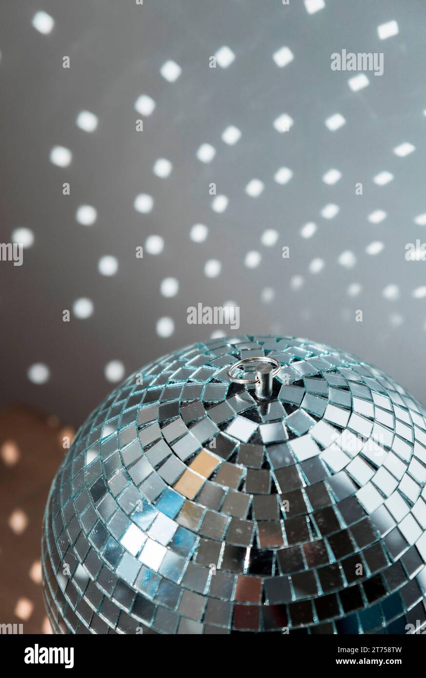 Big disco ball with bright party lights Stock Photo