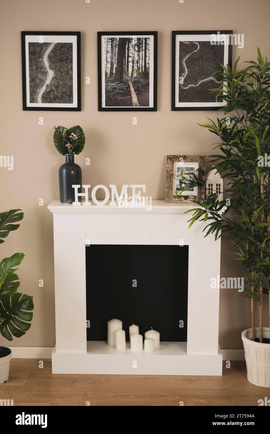 Classy living room with chimney Stock Photo Alamy