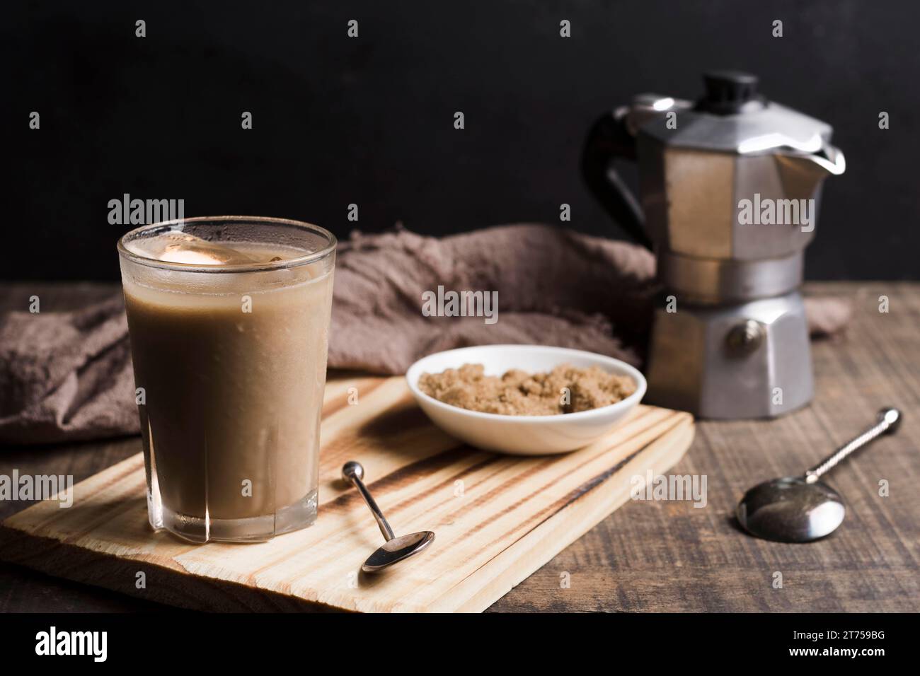Coffee with ice cubes glass grinder Stock Photo
