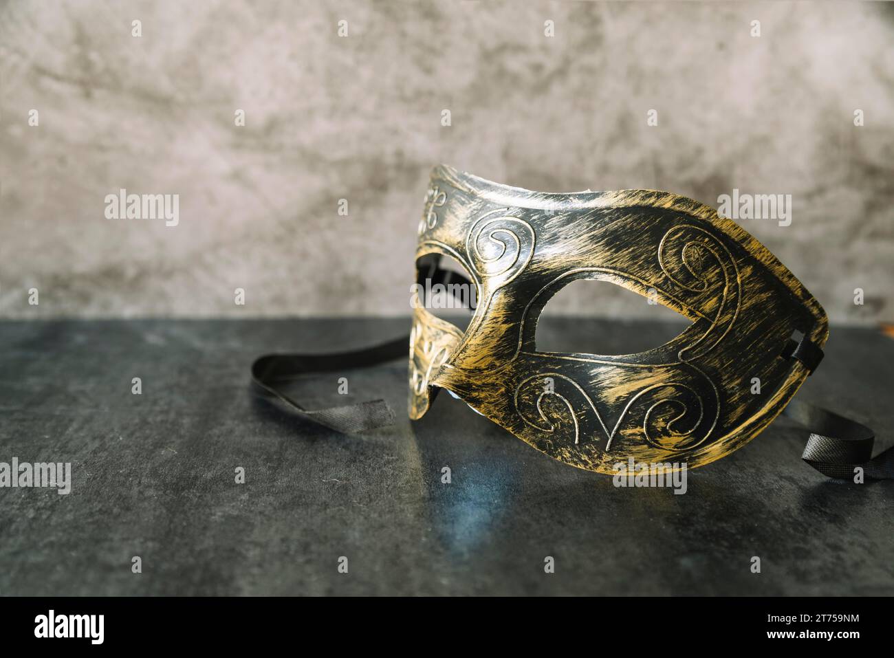 Elegant mask with gold black paint Stock Photo
