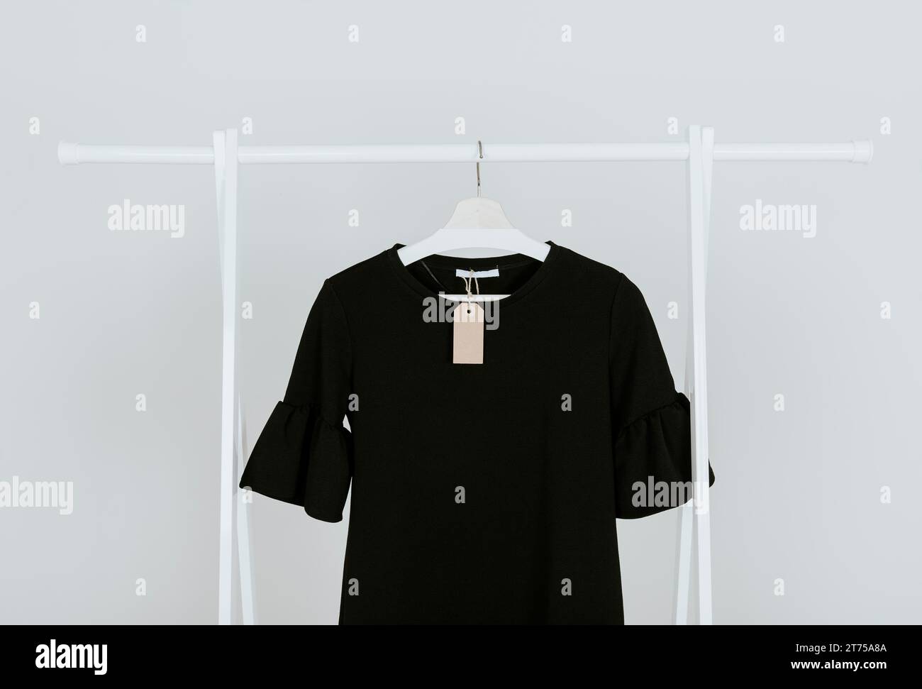 Hanging black blouse Stock Photo