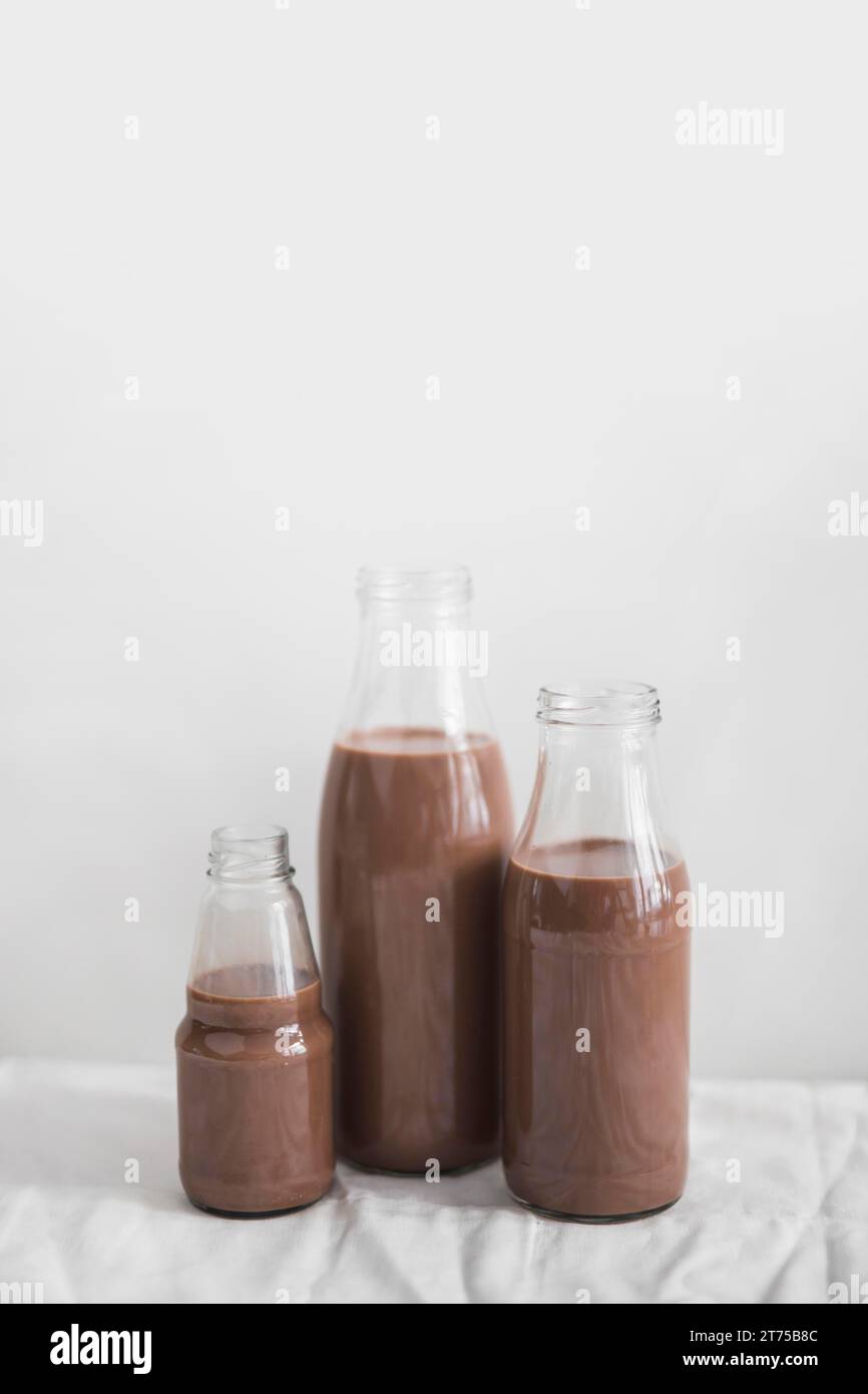 Still life chocolate milkshake bottle against white background Stock Photo