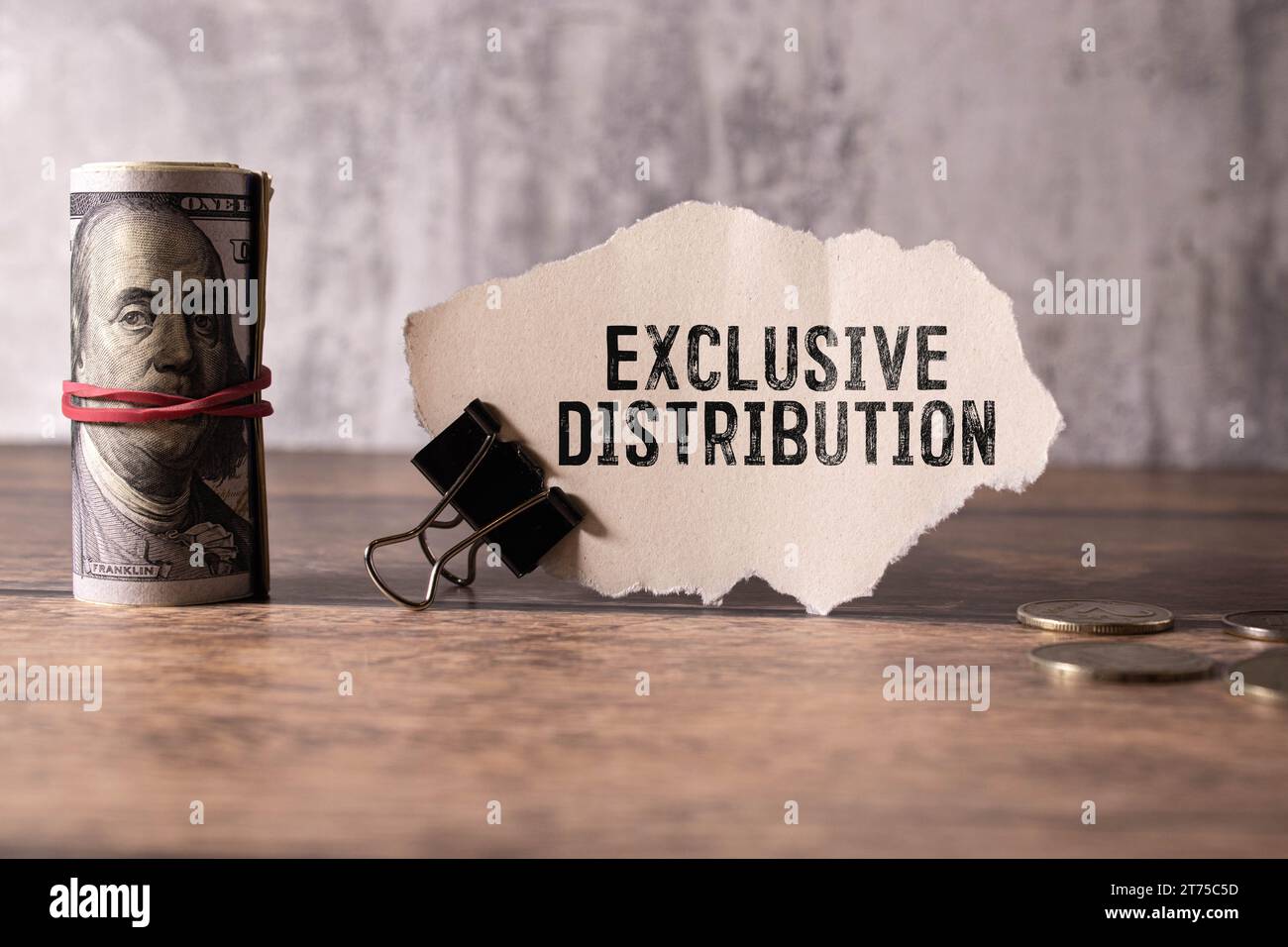 text Exclusive Distribution on black paper Stock Photo Alamy