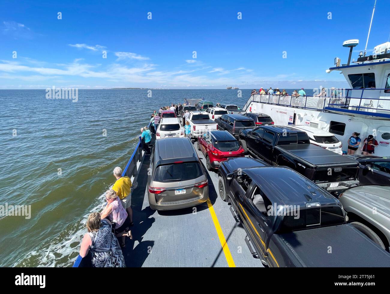 Mobile Bay, AL - March 17, 2022: The car ferry Marissa Mae Nicole seen traversing Mobile Bay between Fort Morgan and Dauphin Island.  The ferry saves Stock Photo
