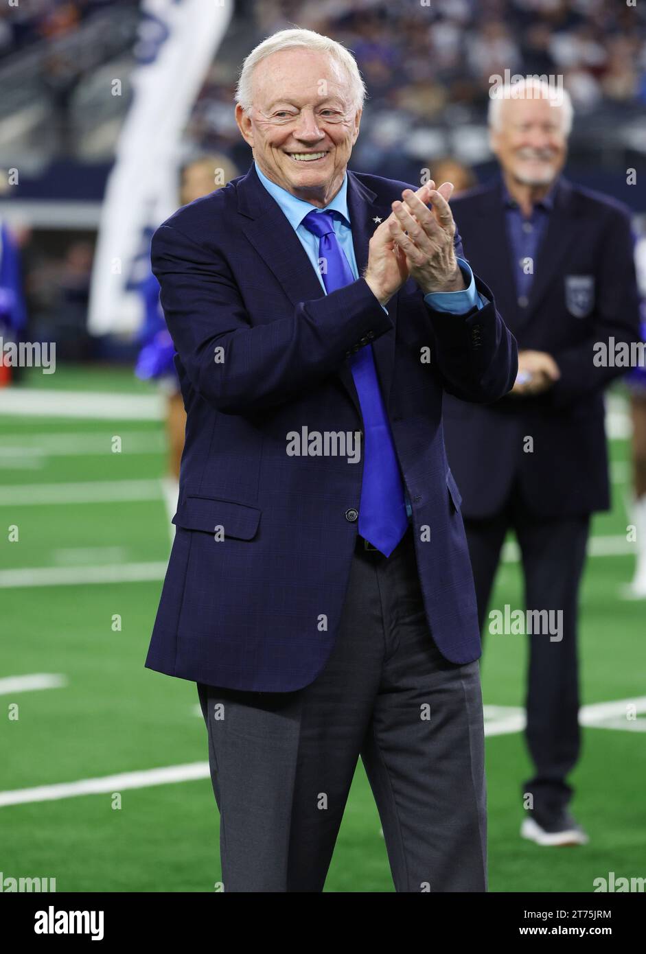 Arlington,TX USA: Dallas Cowboys owner Jerry Jones claps during the ring of honor induction of DaMarcus Ware at halftime of an NFL game against the Lo Stock Photo