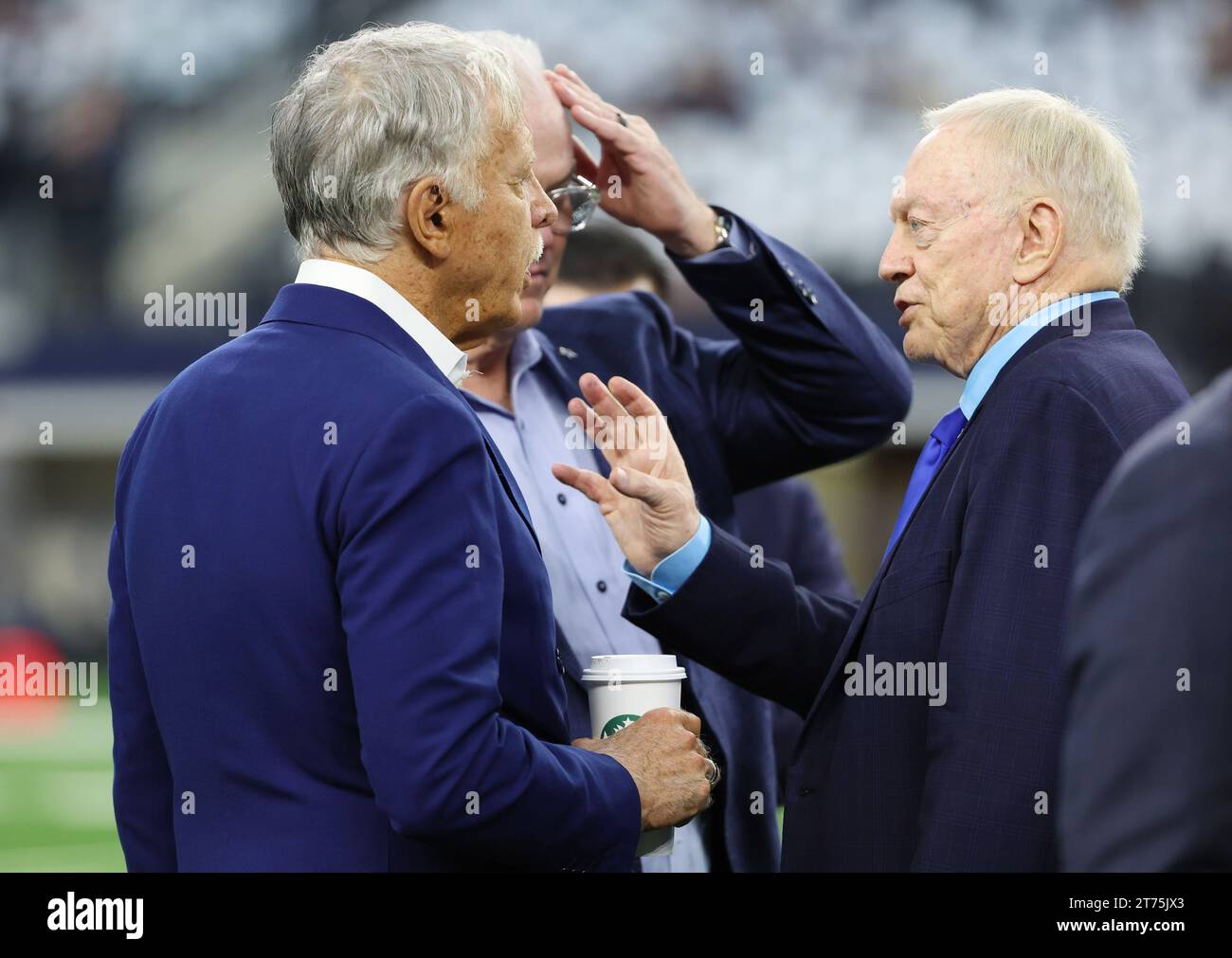 Arlington,TX USA: Los Angeles Rams owner Stan Kroenle talks with Dallas Cowboys owner Jerry Jones before an NFL game at AT&T Stadium, Sunday, October Stock Photo