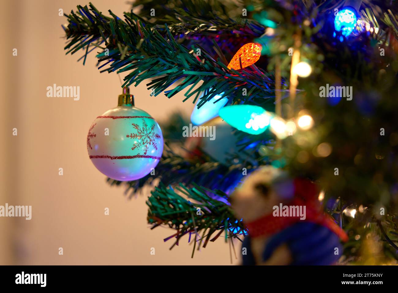 Christmas Tree Decorations and Lights. Festive holiday decorations on a Christmas tree. Stock Photo