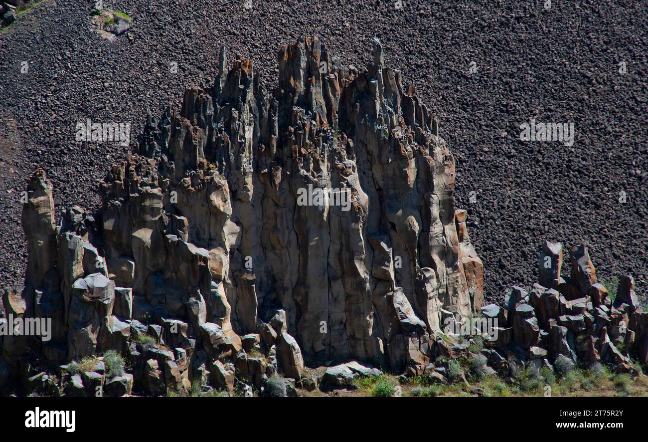 Spires of volcanic rocks reach to the sky Stock Photo