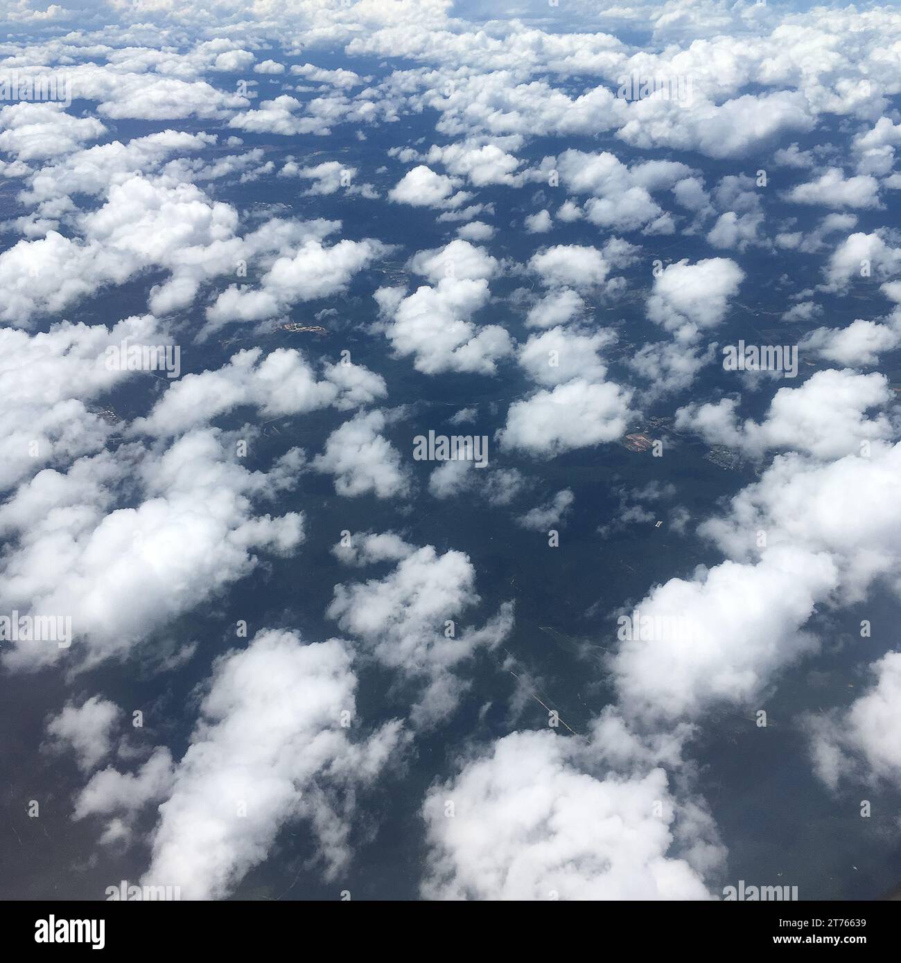 Amazing sky view through the plane window. View cửa sổ máy bay Stock Photo