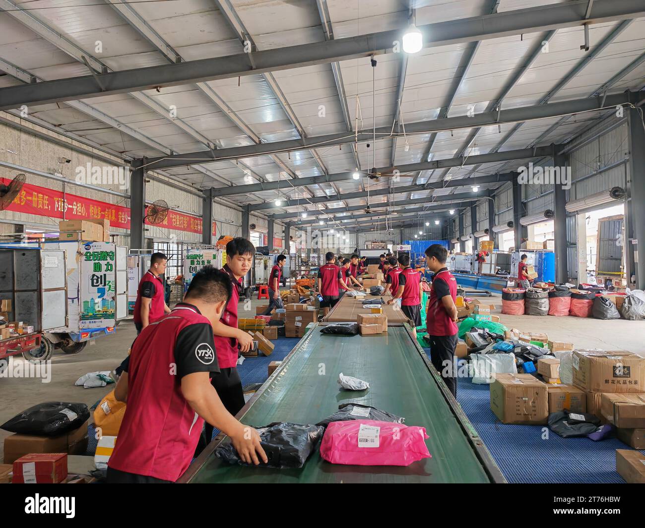 Dongxing, China's Guangxi Zhuang Autonomous Region. 7th Nov, 2023. Staff members work at a logistic center in Dongxing, south China's Guangxi Zhuang Autonomous Region, Nov. 7, 2023. TO GO WITH 'Economic Watch: China's 'Double 11' shopping festival injects vigor into foreign trade' Credit: Huang Yaoteng/Xinhua/Alamy Live News Stock Photo