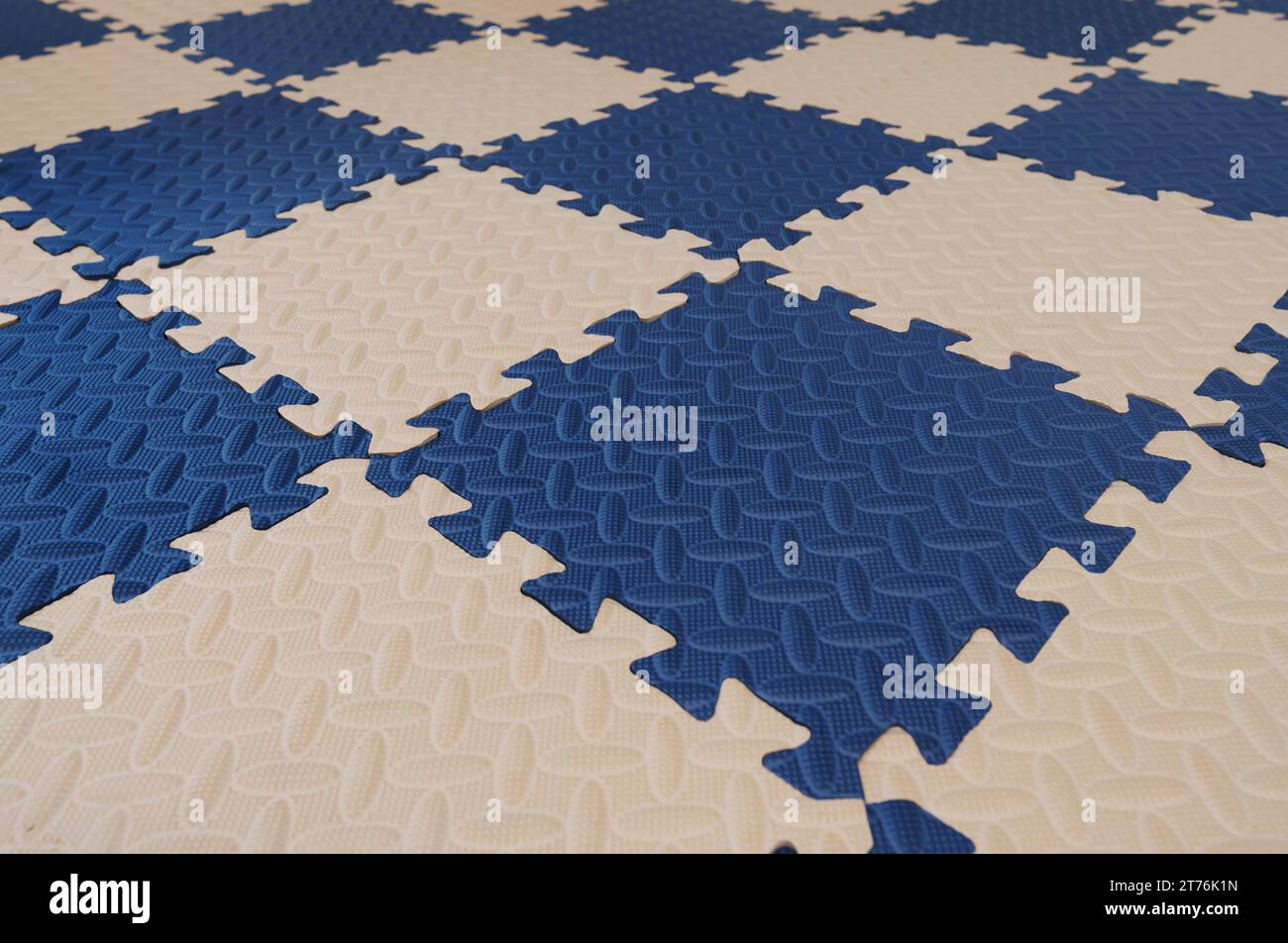foam flooring tiles or jigsaw mat for baby. background and texture