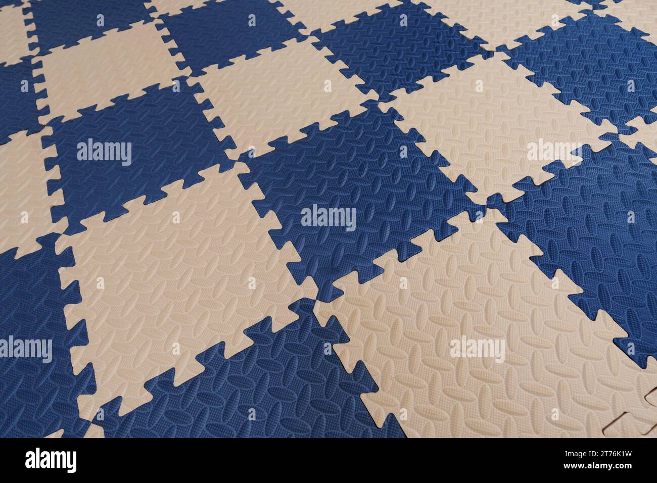 foam flooring tiles or jigsaw mat for baby. background and texture