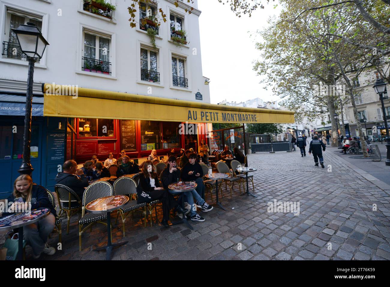 Au Petit Montmartre at the Place des Abbesses, Paris, France. Stock Photo