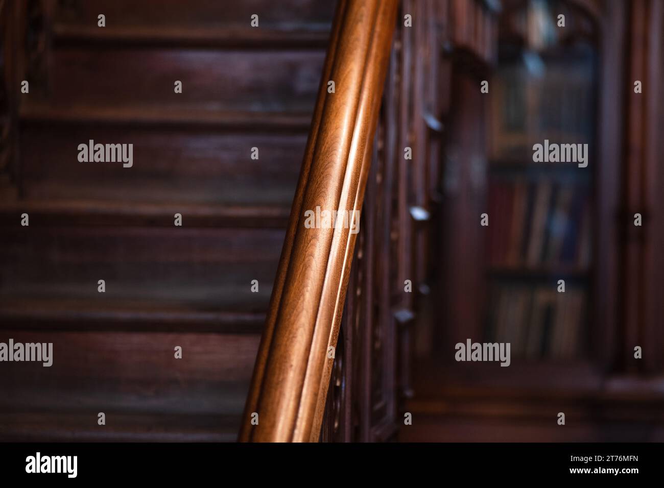 warm gloomy background, detail of a classic interior, wooden staircase ...