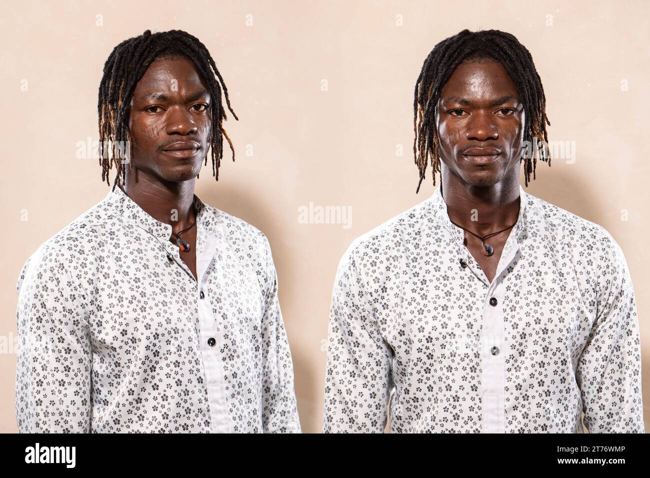 Identical twins. African homozygous twin brothers concept. Subject seen from different angles. Model with dreadlocks hair Stock Photo