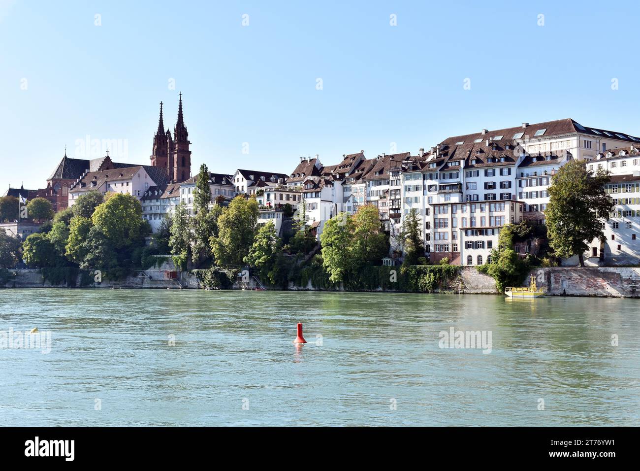 The oldest part of the city of Basel, the Rhine, the Cathedral & houses, some stacked on top of another against the steep wall of the valley Stock Photo
