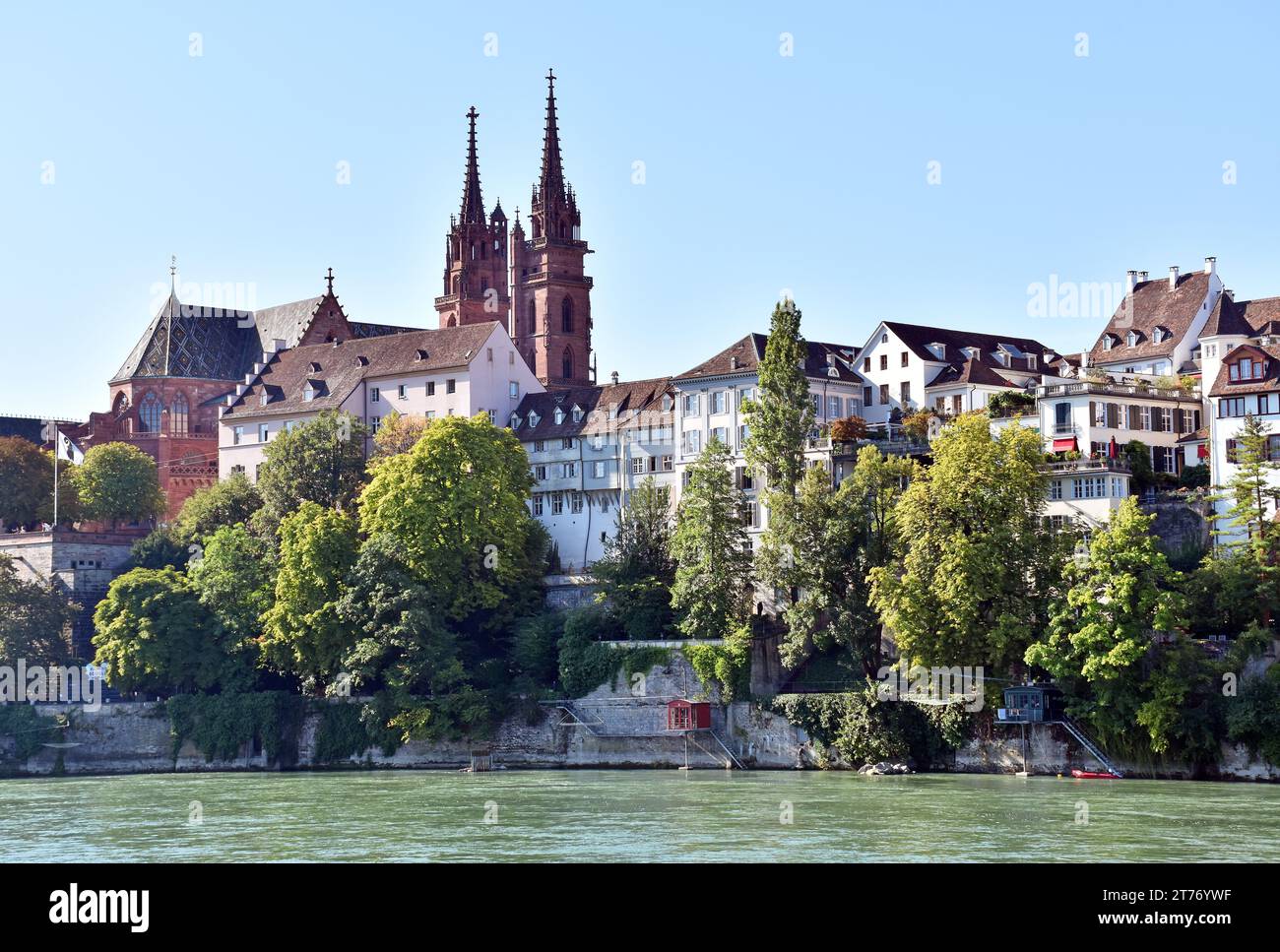 The oldest part of the city of Basel, the Rhine, the Cathedral & houses, some stacked on top of another against the steep wall of the valley Stock Photo