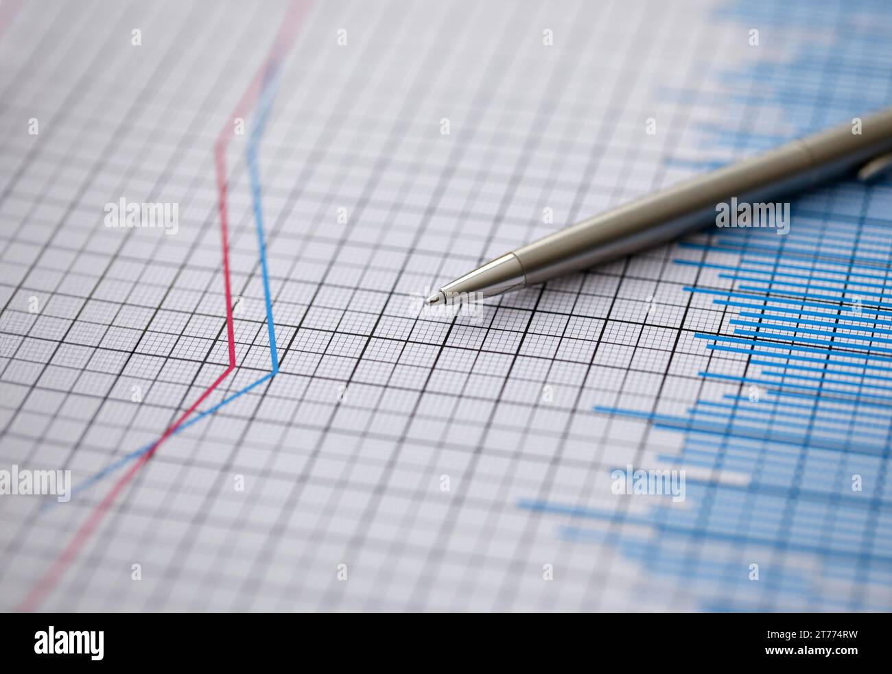 Silver pen lies on paper documents with color Stock Photo
