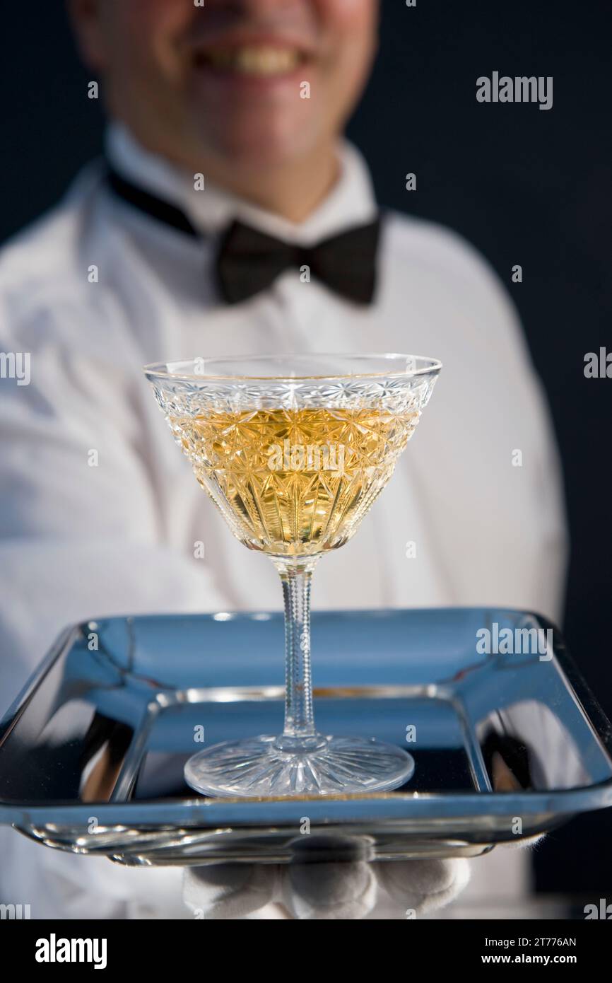 Waiter wearing uniform hi-res stock photography and images - Alamy