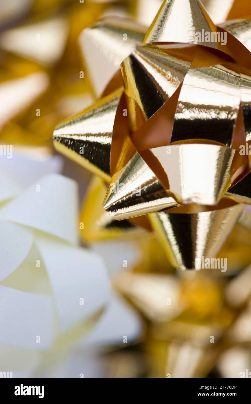 Extreme close up of gold bows Stock Photo