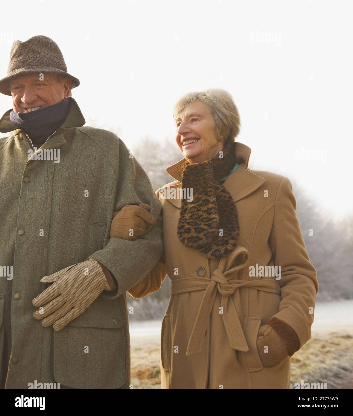 Portrait of a mature couple walking in the park Stock Photo