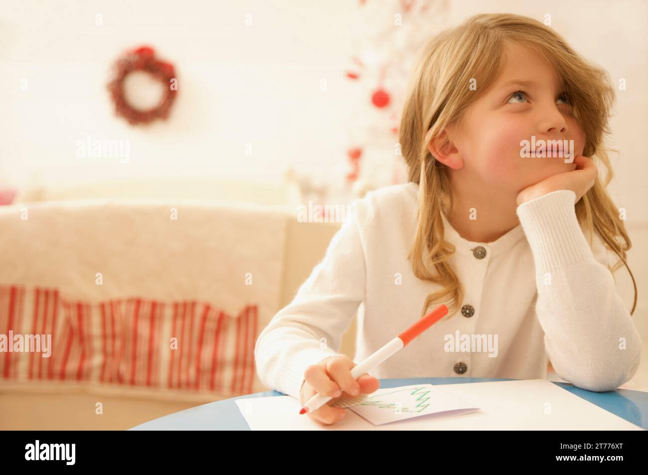 girl-writing-a-letter-to-father-christmas-stock-photo-alamy