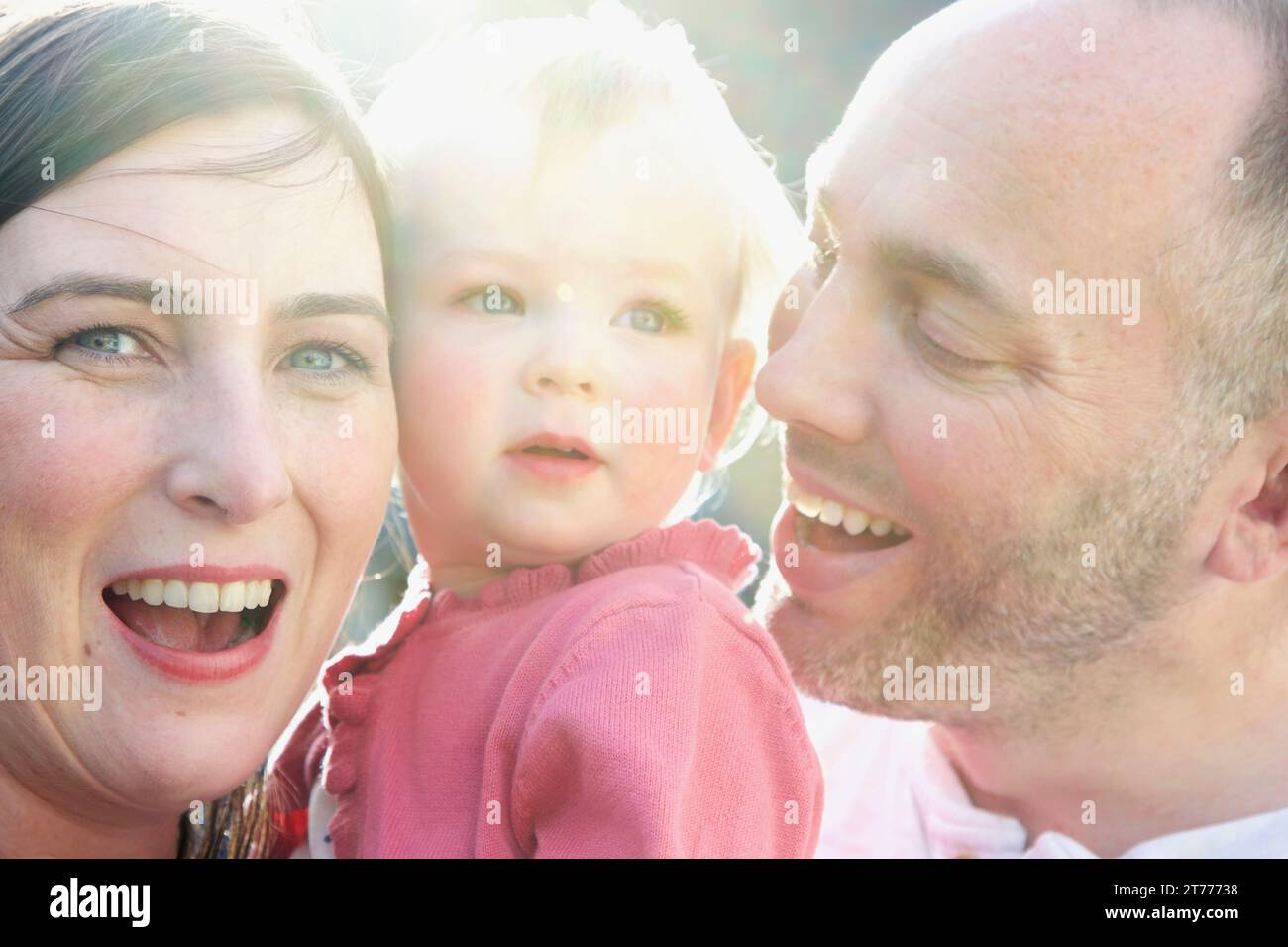 Portrait of Family Outdoors Smiling Stock Photo