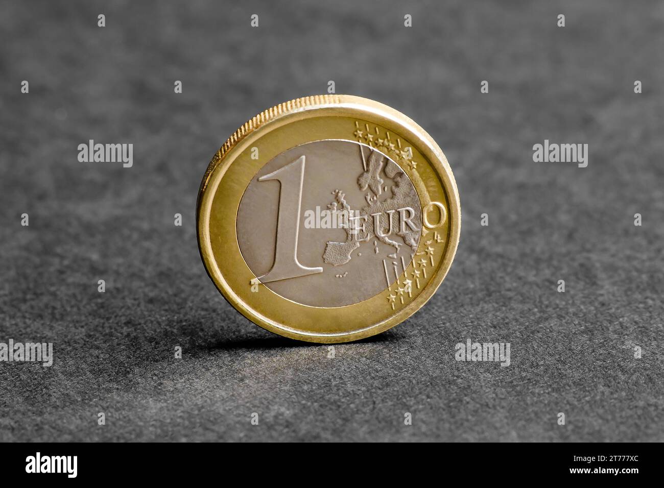 one euro coin on black background Stock Photo - Alamy