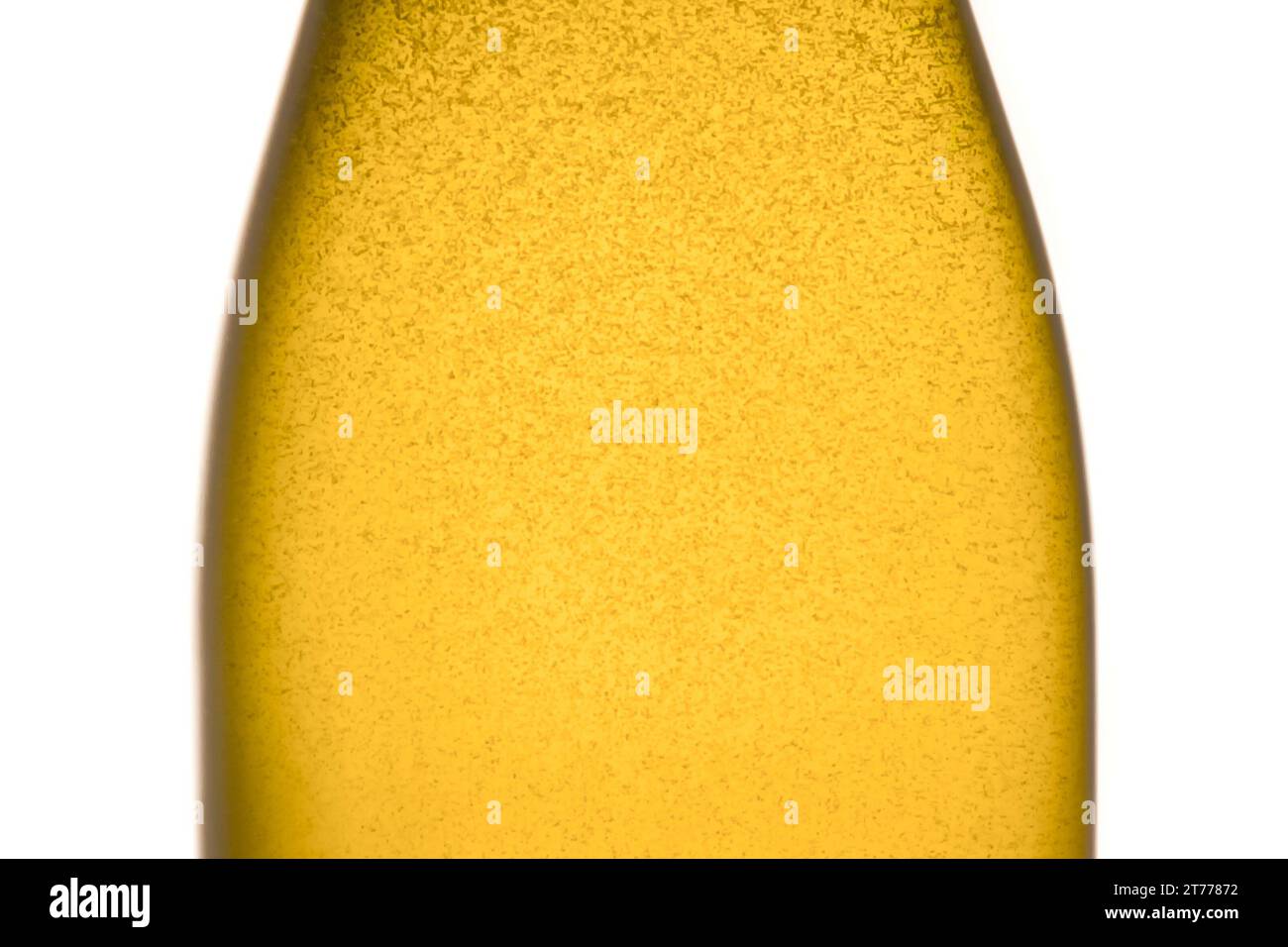 detail of champagne bottle with golden bubbles on white background Stock Photo